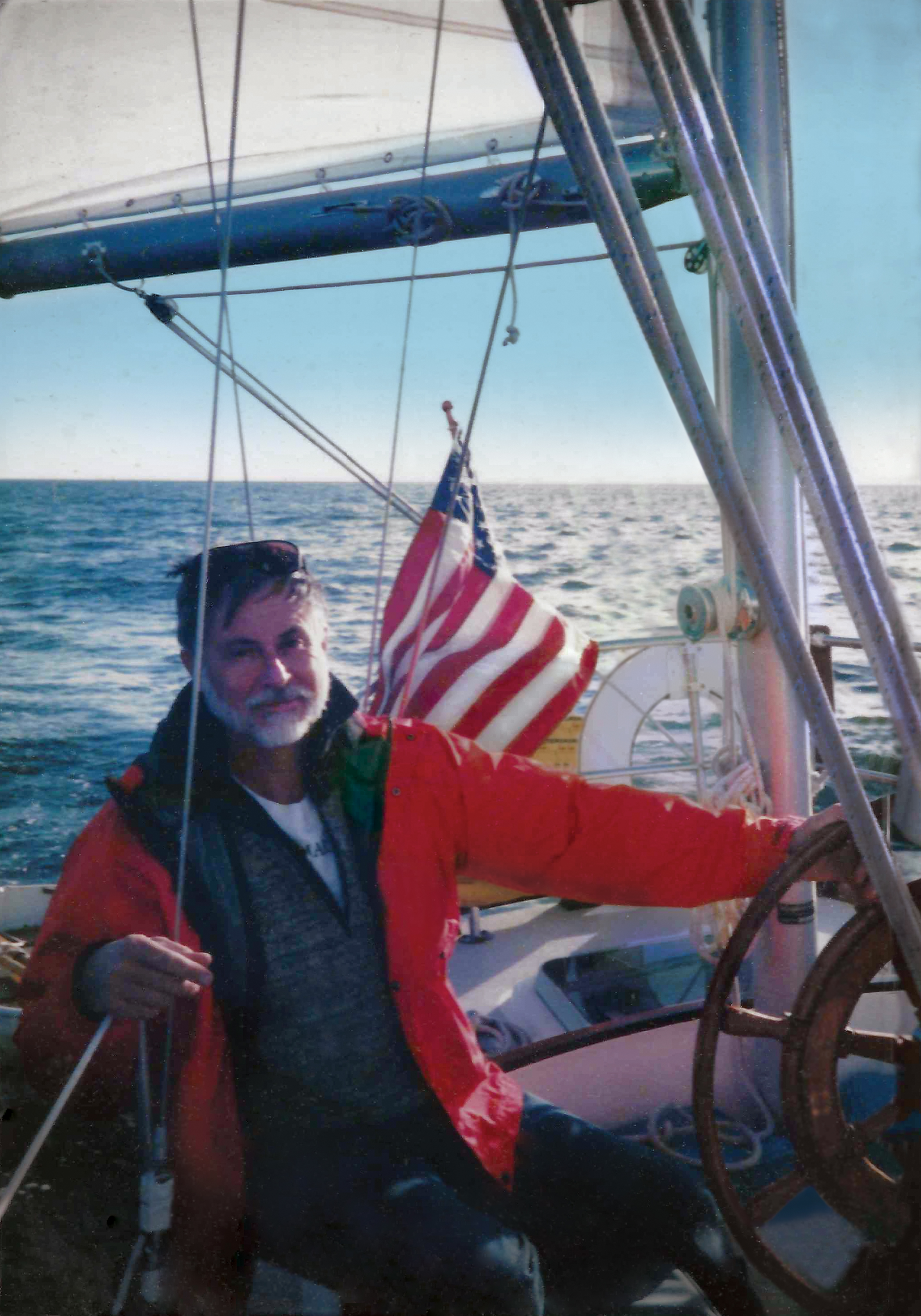 Jerry at the helm of his sailboat